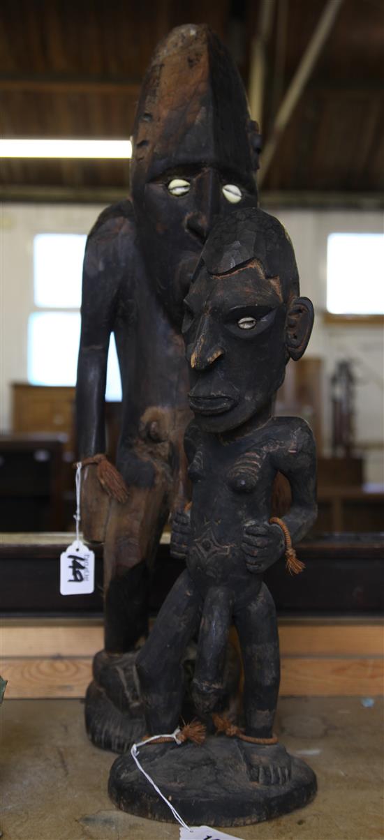 Two Indonesian tribal wood figures